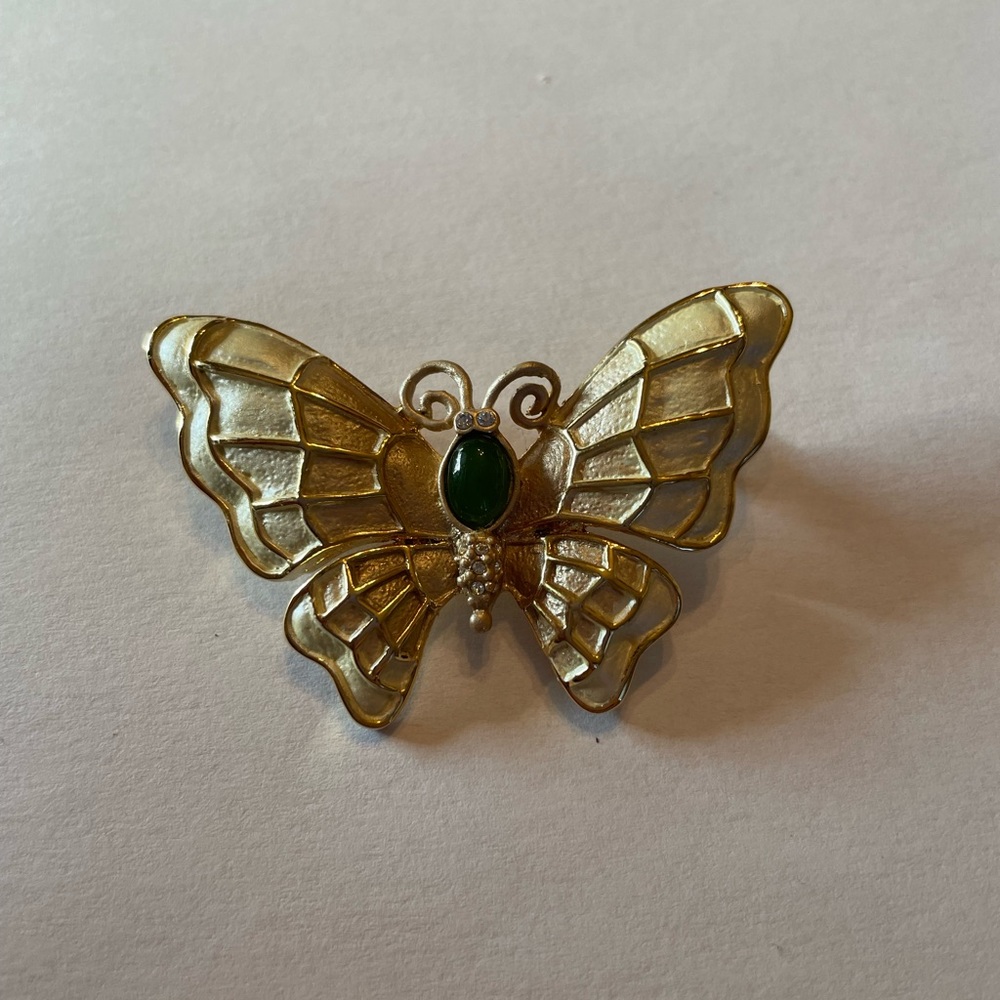 Gold butterfly pin